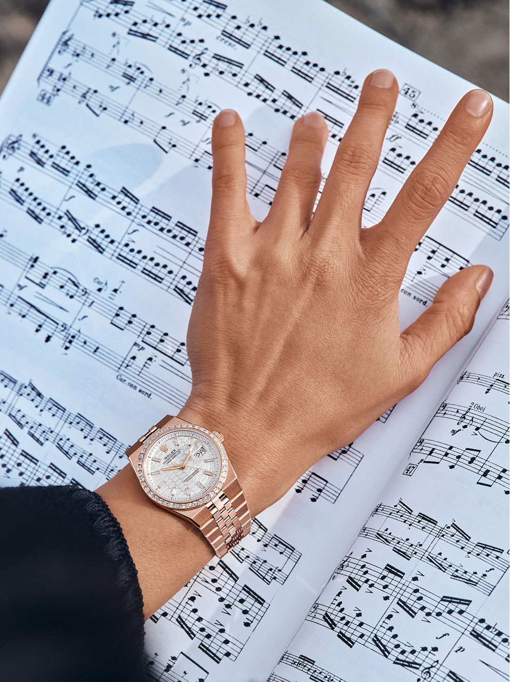 Wrist shot over sheet music
