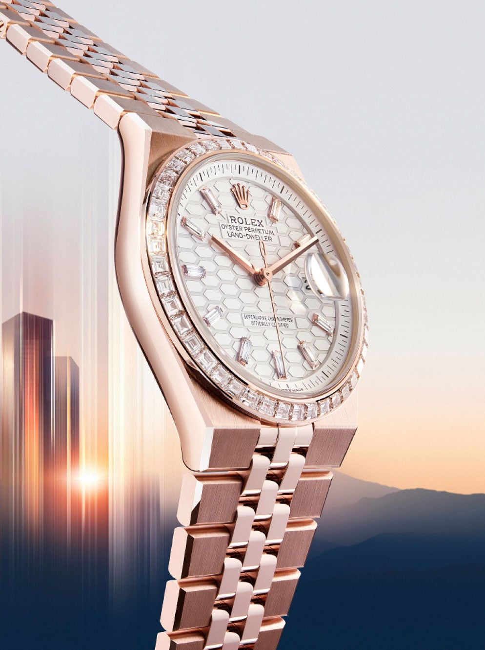 Close-up of the watch on bracelet at sunrise